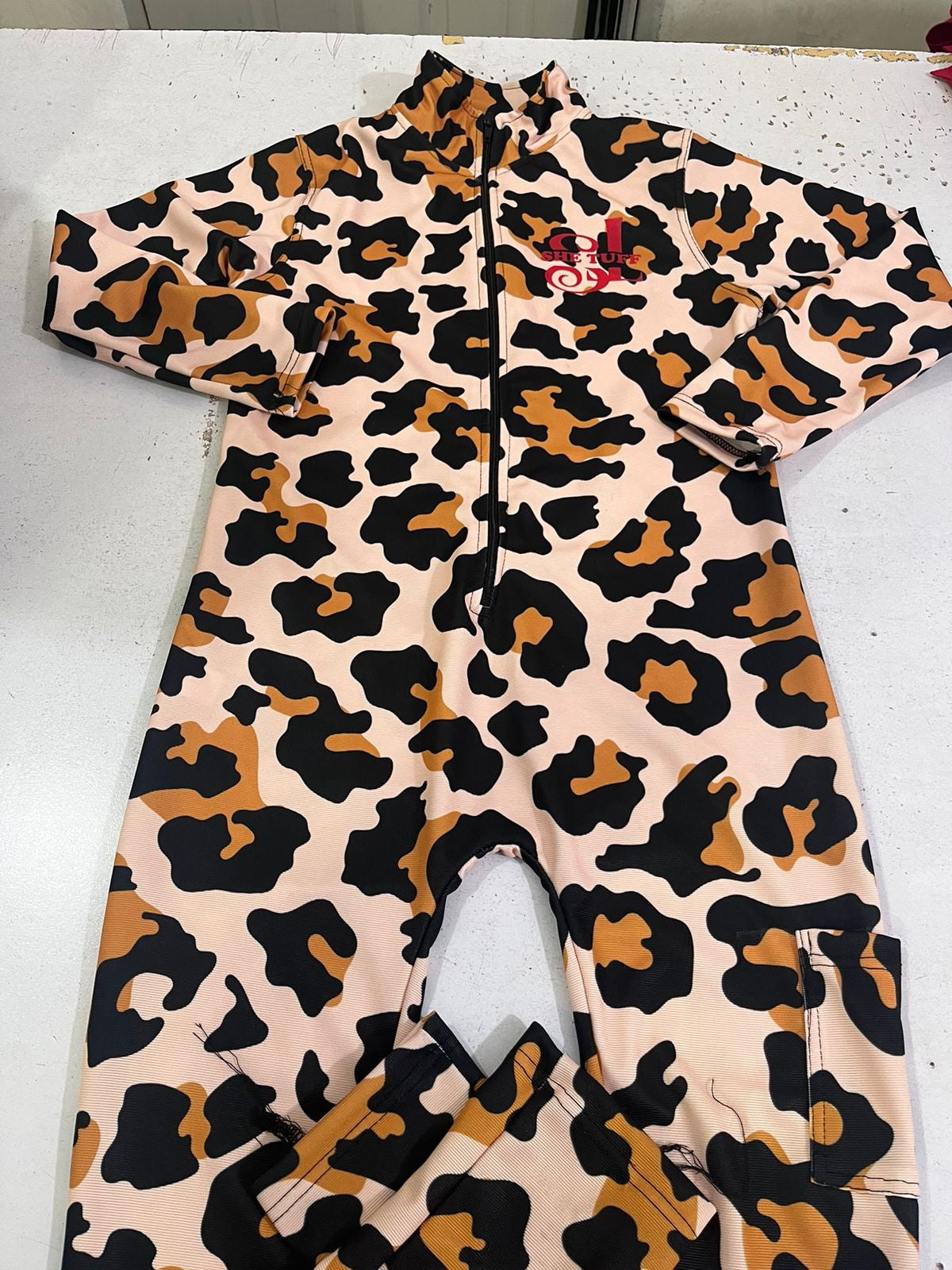 Cheetah Print She Tuff Body Suit